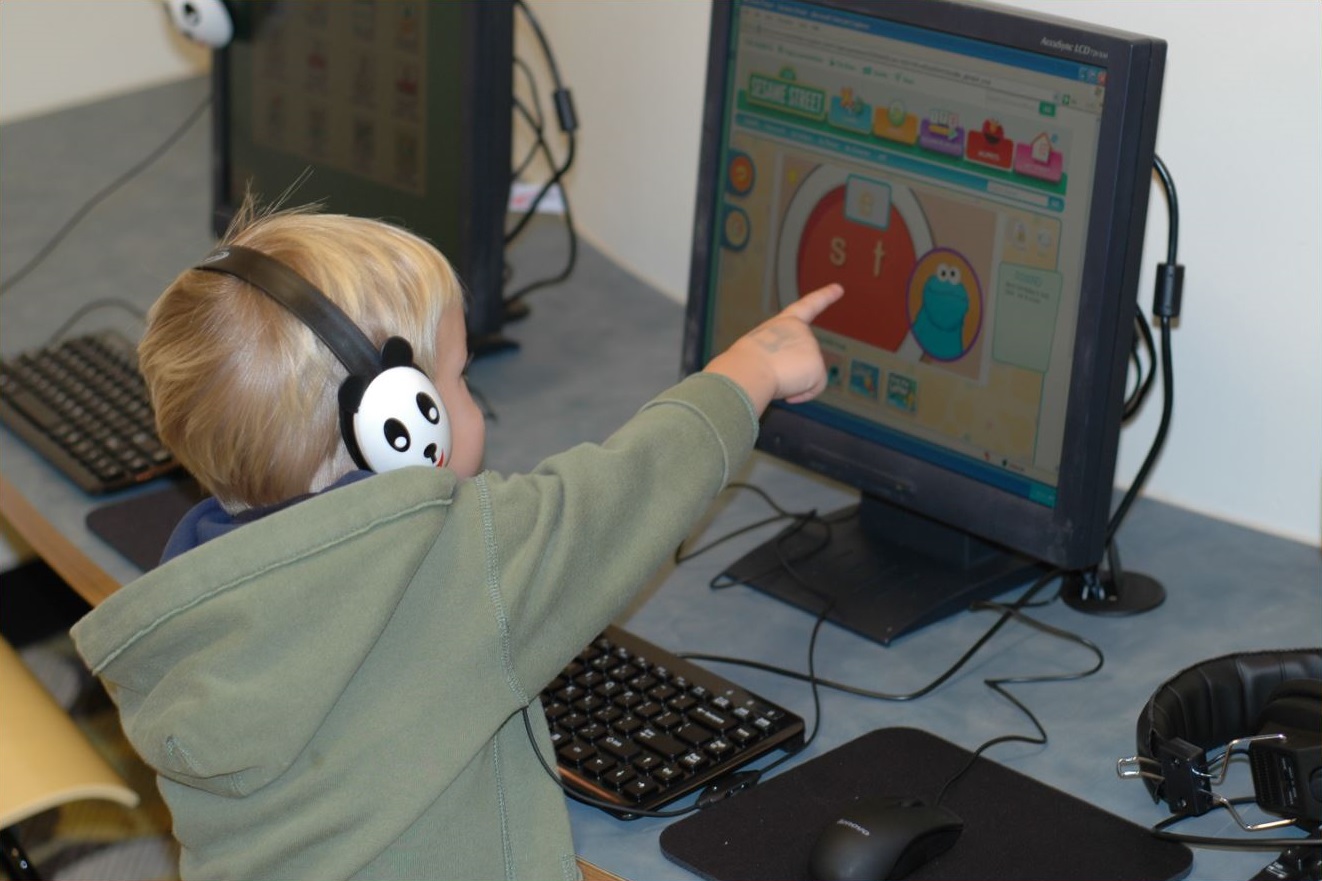 Boy using computer at King County Libraries