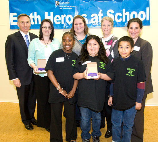 Ginger Ott along with students and other staff receive the King County award in April 2011.