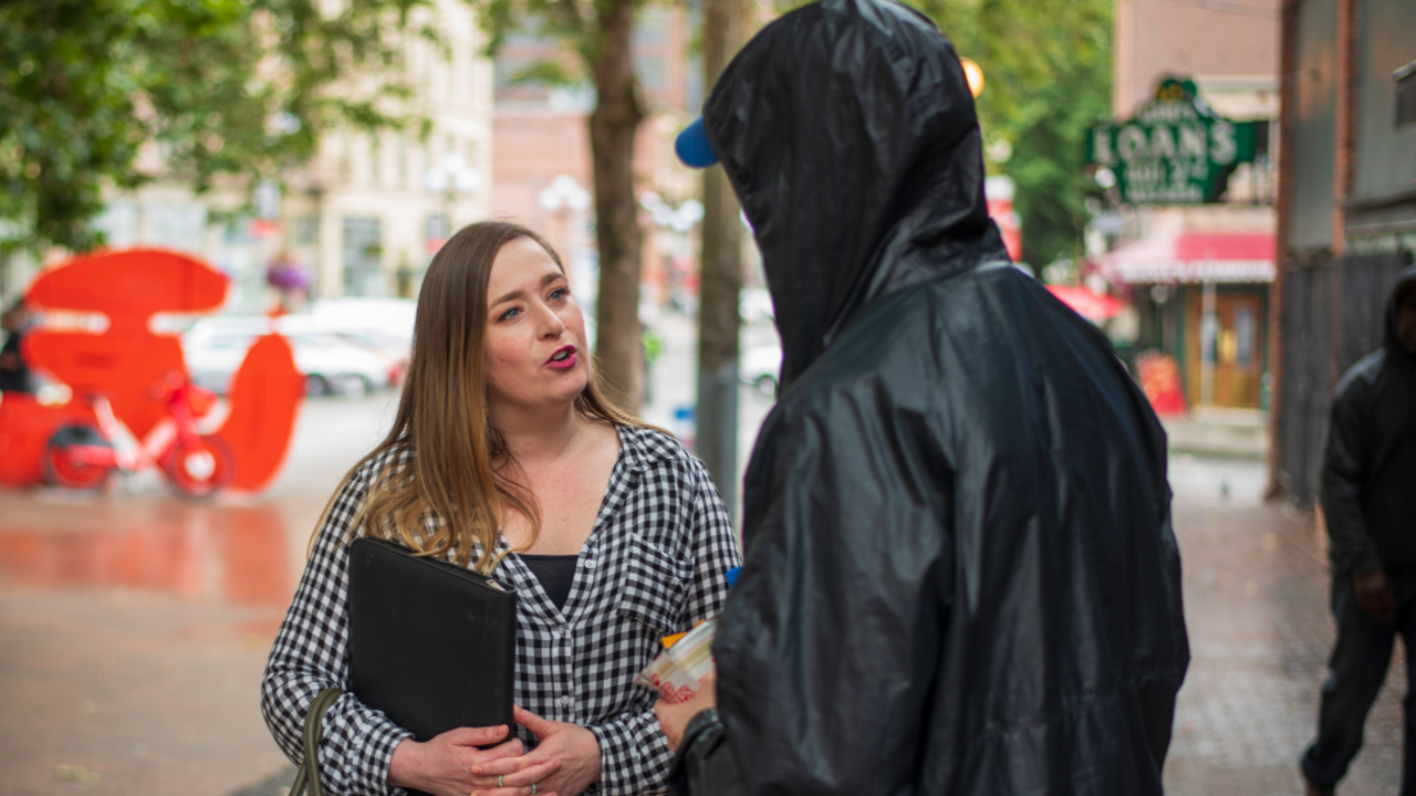 Caseworker and client on the street