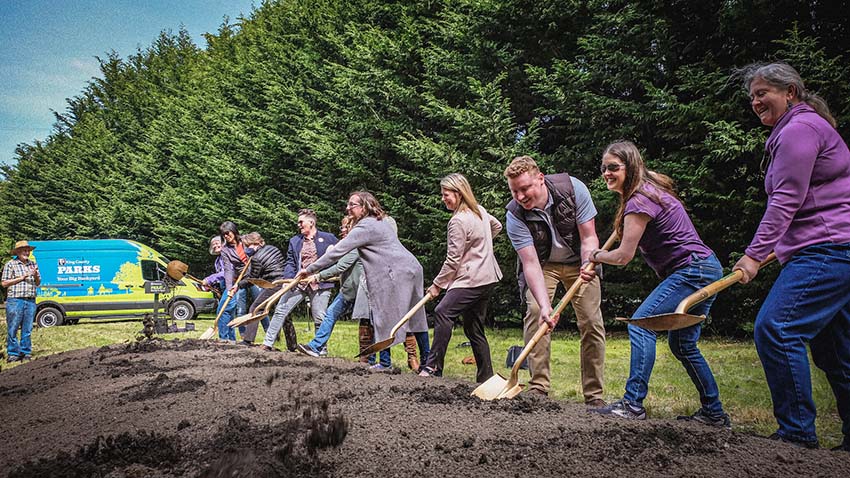 Dignitaries with shovels break ground on the East Lake Sammamish Trail