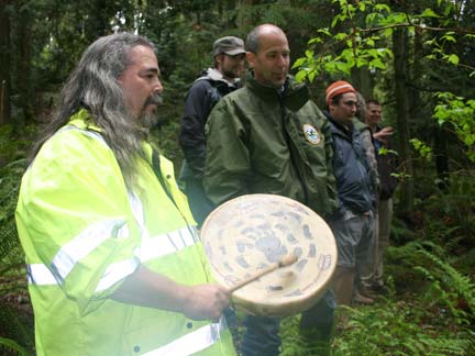 Snoqualmie native ceremonial drummer Ray Mullen celebrating the release of young kokanee into Ebright Creek