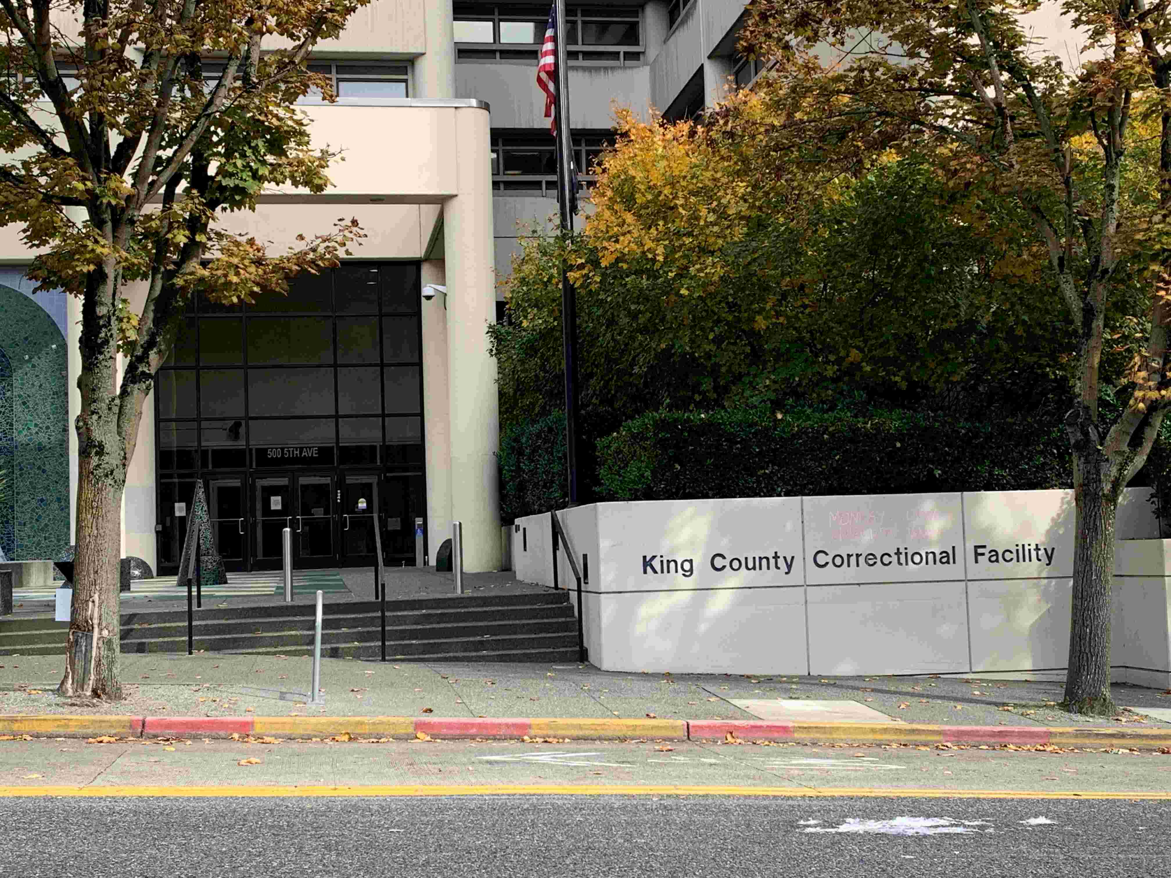 Street view of the entrance to the King County Correctional Facility building in Seattle