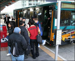 photo: bus and passengers