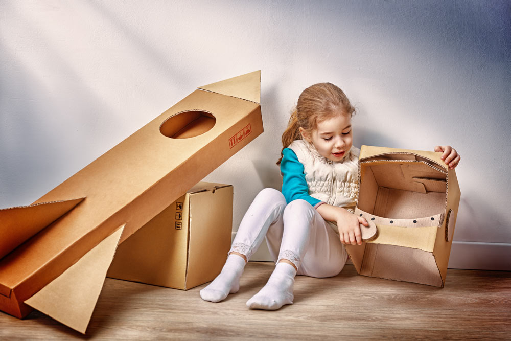 image of little girl with a home-made cardboard costume