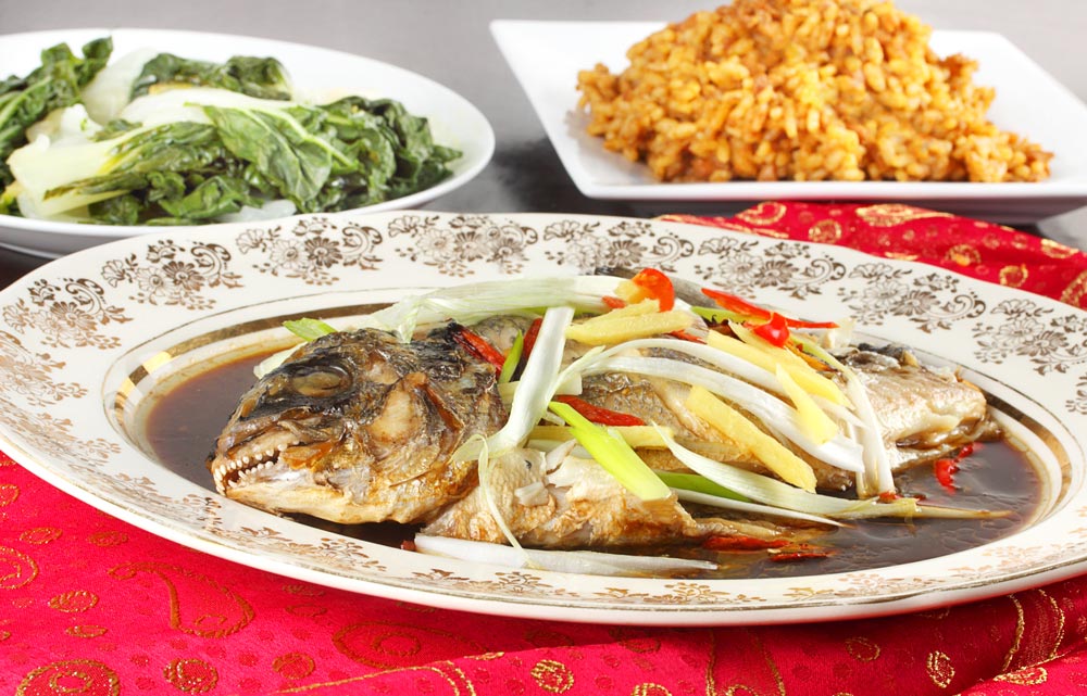 image of a whole, cooked fish on a platter