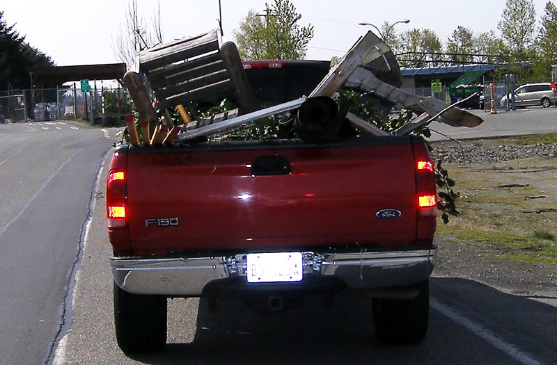 tip truck with unsecured load