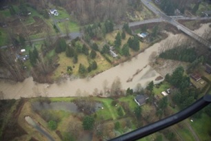 An aerial photo taking in January 2011 showing minor flooding on the Cedar River at the Elliott Bridge Reach Mitigation Project area.