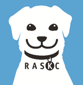 RASKC logo of a dog with a blue background.