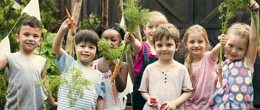 Local Food Initiative - kids with carrots