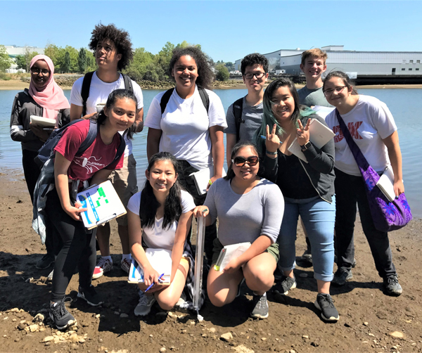 Group of high school students, enrolled in the WTD internship program, on a tour of the Duwamish River. 