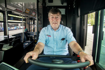 photo: bus driver behind wheel